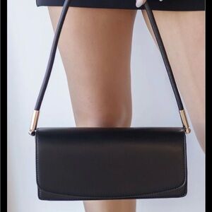 MMS Design Studio Black Shoulder Bag with Gold Accents